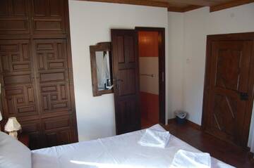 Фото номера Четырехместный номер с балконом Гостевой дом Kazasovata Guest House г. Трявна 12