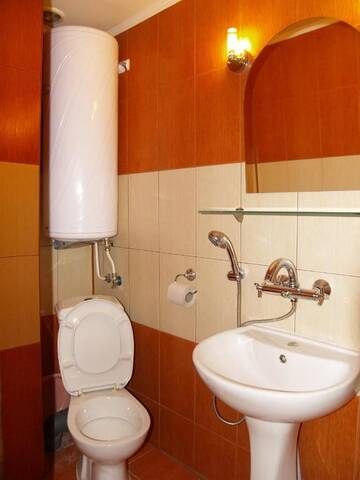 Фото номера Четырехместный номер с балконом Гостевой дом Kazasovata Guest House г. Трявна 8