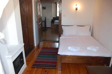 Фото номера Четырехместный номер с балконом Гостевой дом Kazasovata Guest House г. Трявна 21
